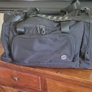 Harrisons Sleek Black Duffel Bag with Logo Accent